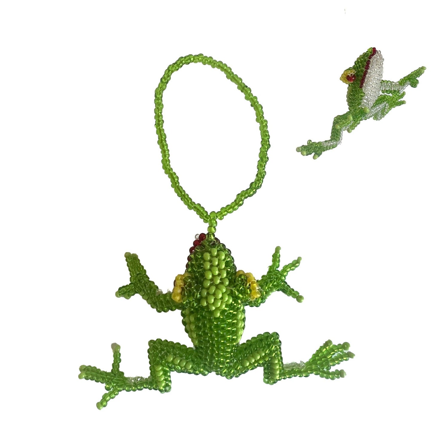 Green beaded frog ornament on a white background