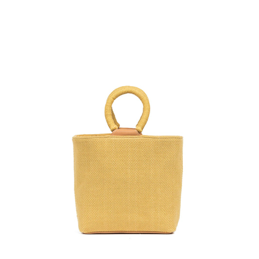Yellow woven handbag with a circular handle on a white background