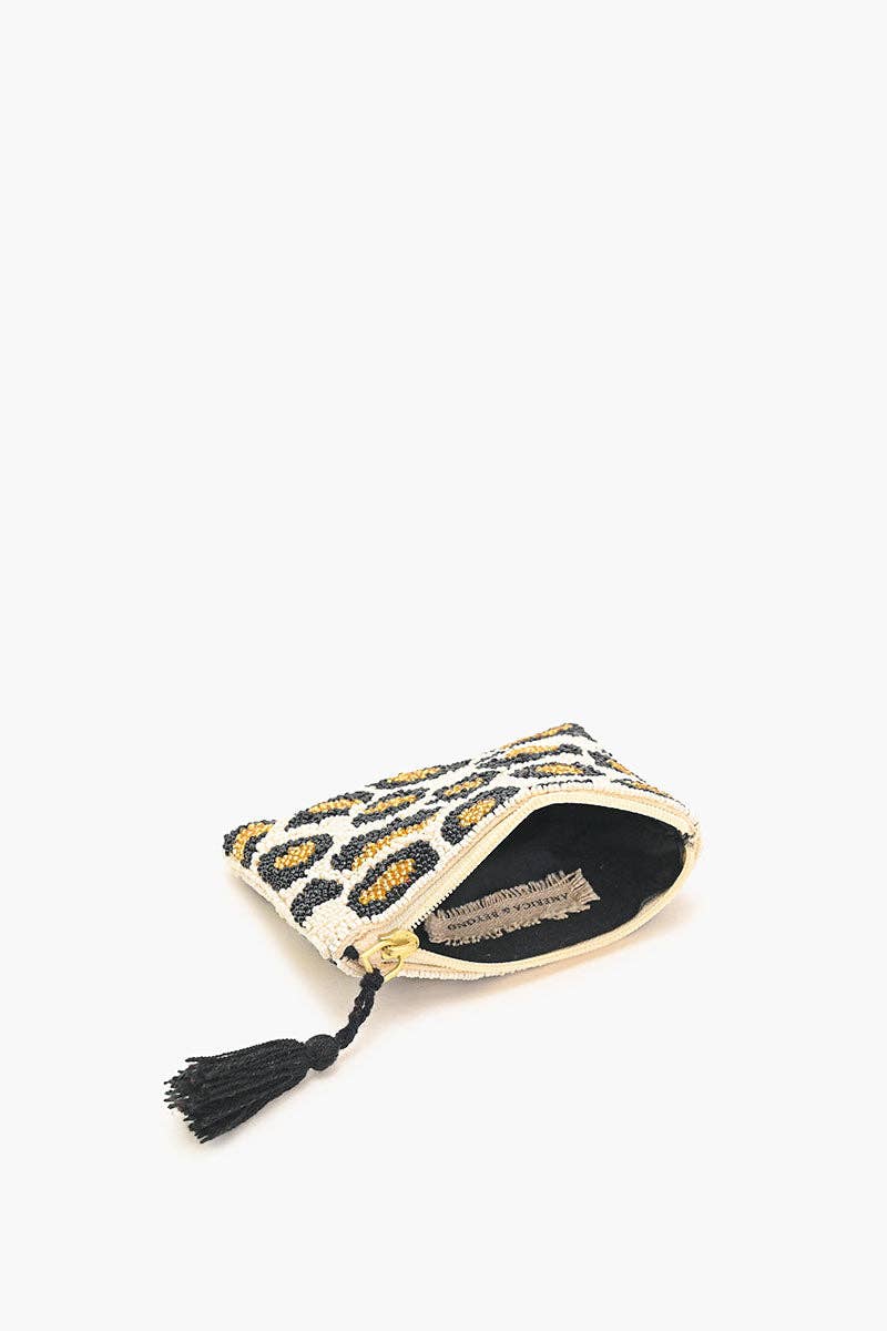 Leopard wallet with tassel on a white background