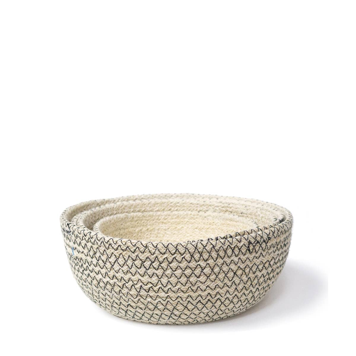 Set of four woven baskets with a geometric pattern on a white background