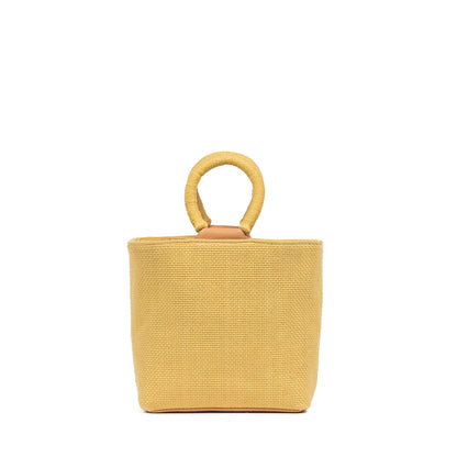 Yellow woven handbag with a circular handle on a white background