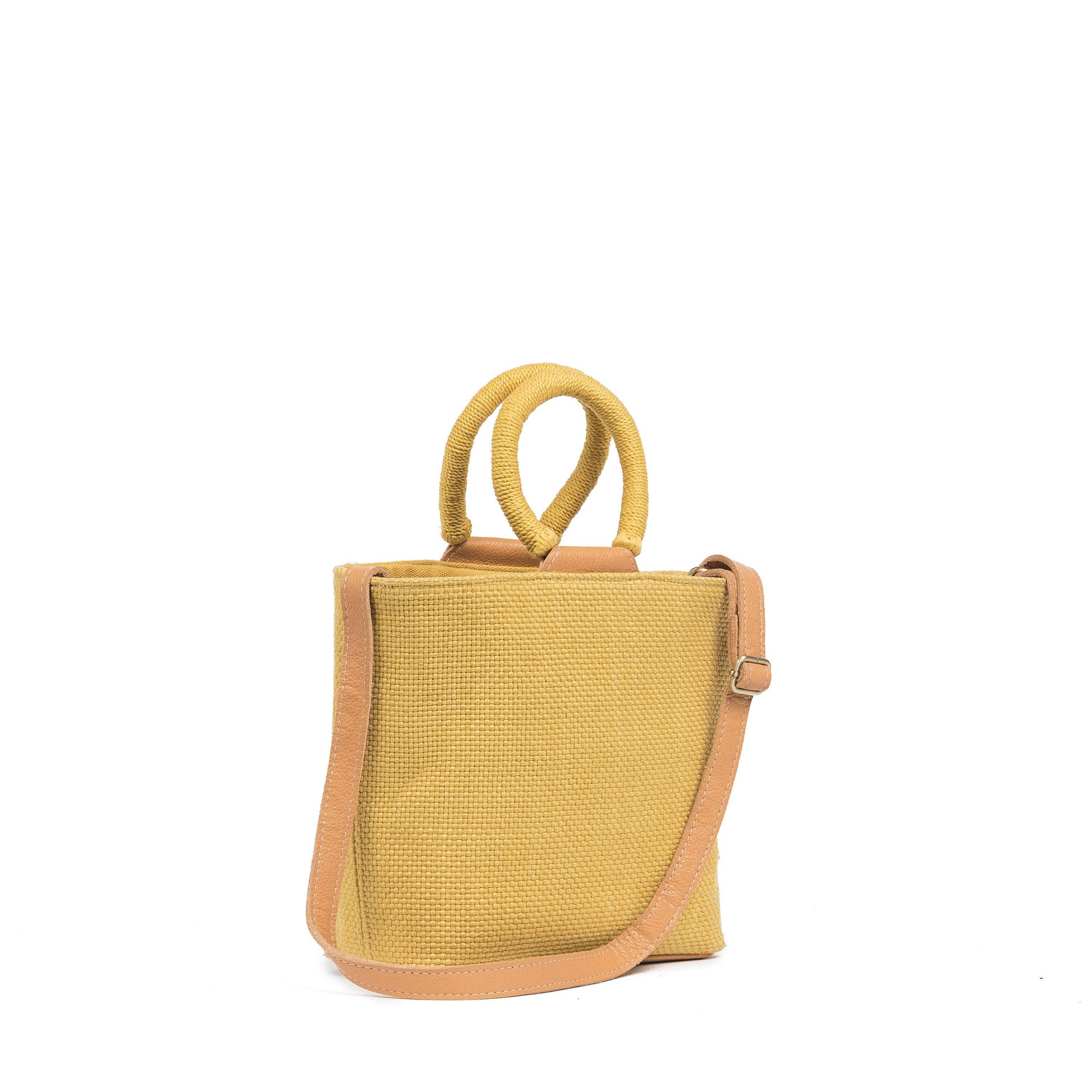 Yellow woven handbag with brown leather accents on a white background