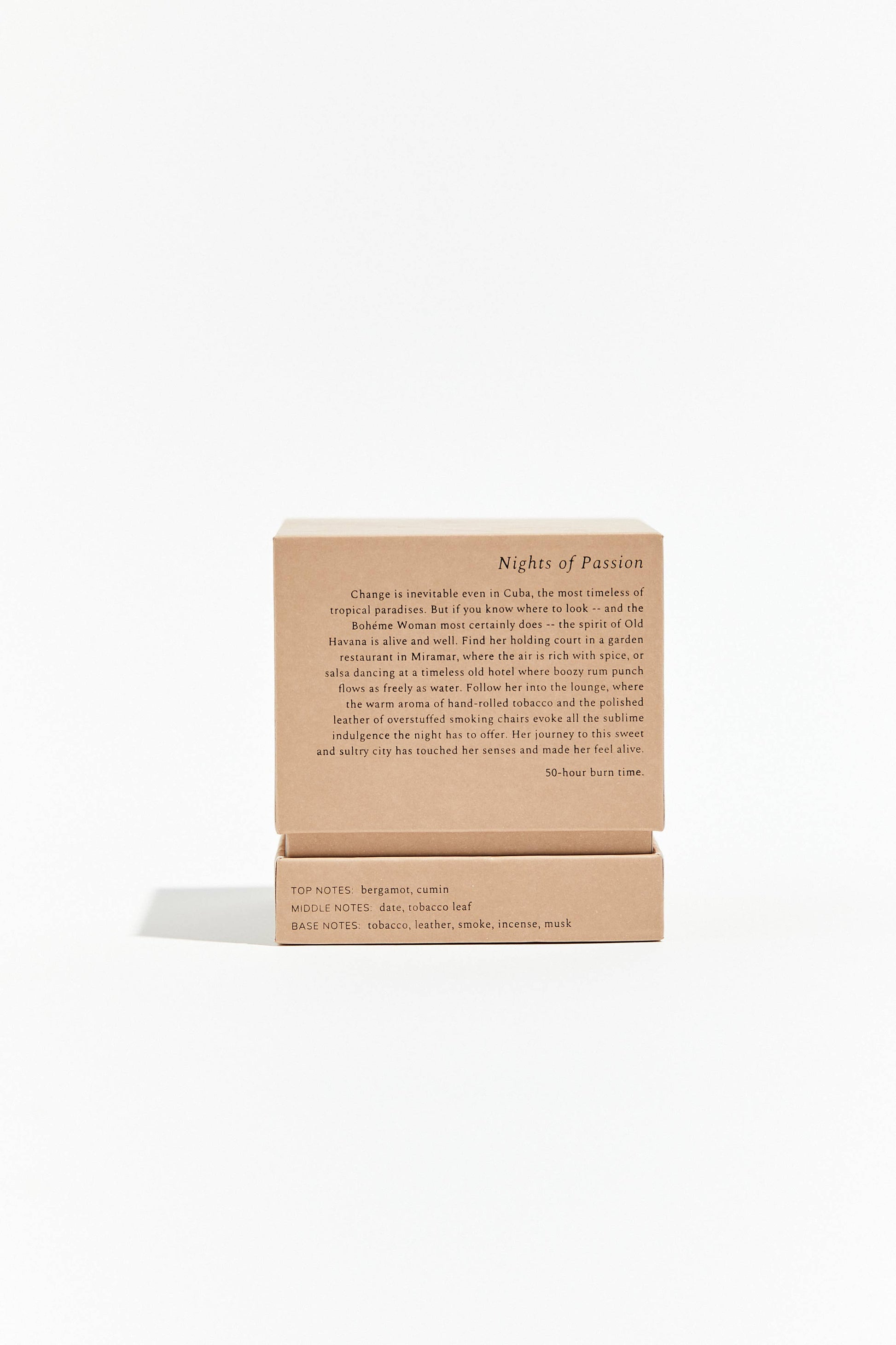 Cardboard candle box with a white product on a light beige background