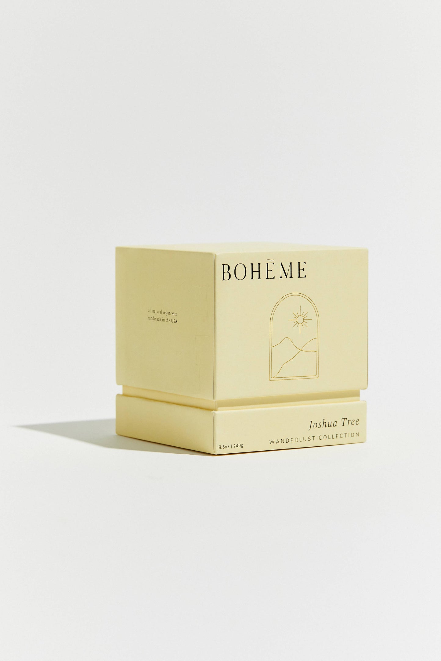 Beige candle box with 'Bohème' branding on a white background