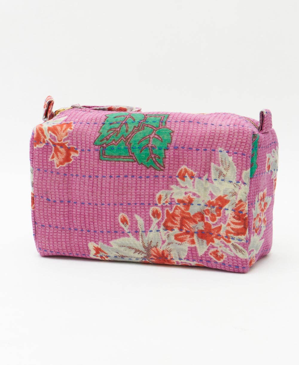 Pink floral-patterned pouch on a white background