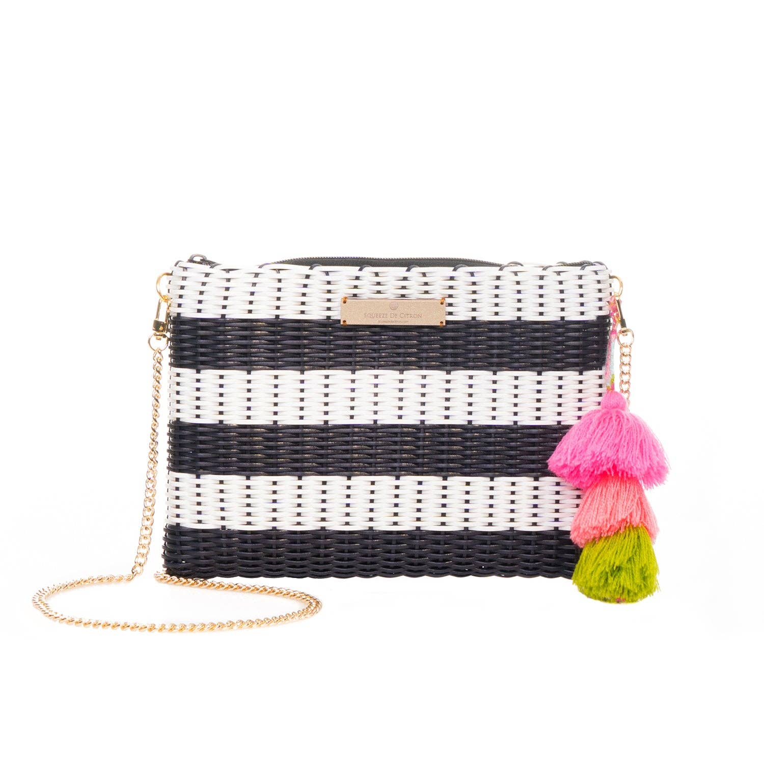 Black and white striped clutch with colorful tassels on a white background