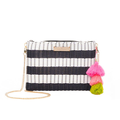 Black and white striped clutch with colorful tassels on a white background