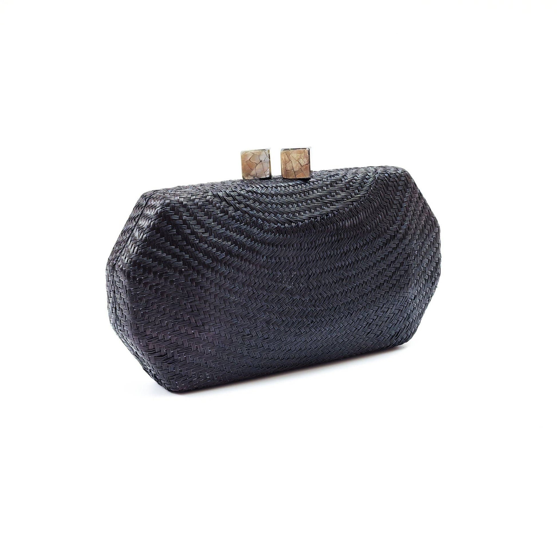 Black woven clutch bag with gold accents on a white background