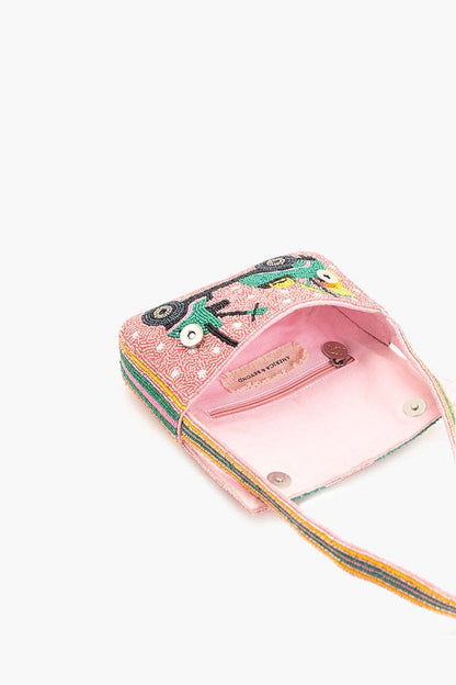 Pink handbag with colorful design on a white background