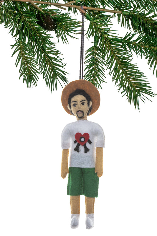 Decorative ornament of a person wearing a white t-shirt with a red heart design on a white background