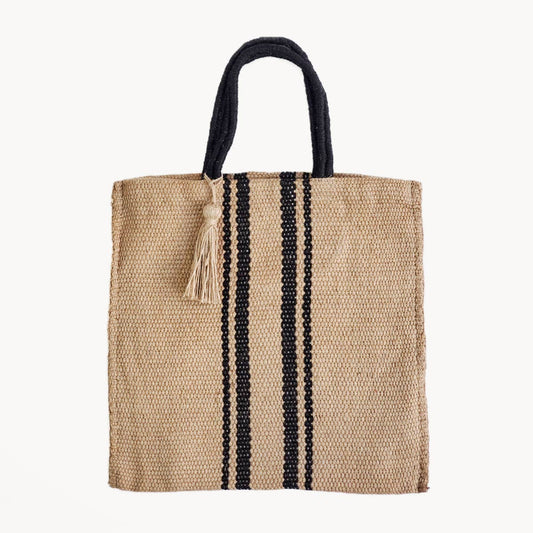 Jute bag with black stripes and handles on a white background