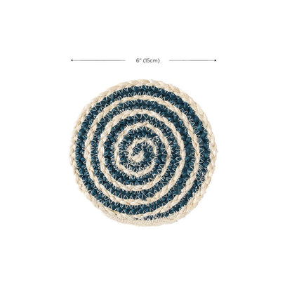 Round woven mat with blue and beige spiral pattern on a white background