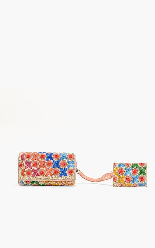 Colorful floral wallet with matching wristlet on a white background