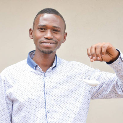 Hand-Carved Bird Ornament in Matte White
