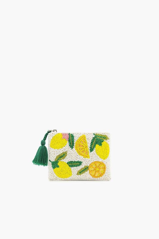 Wallet with lemon and pineapple designs on a white background