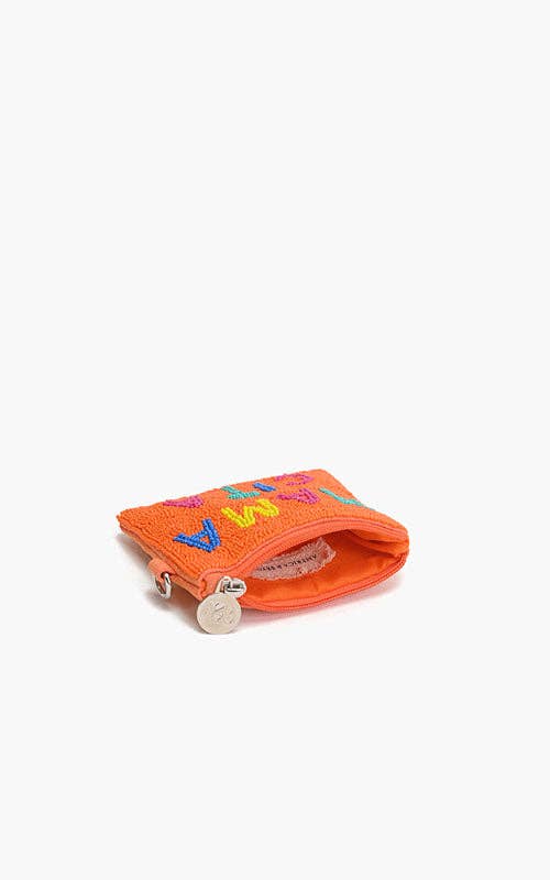 Orange coin purse with colorful letters on a white background