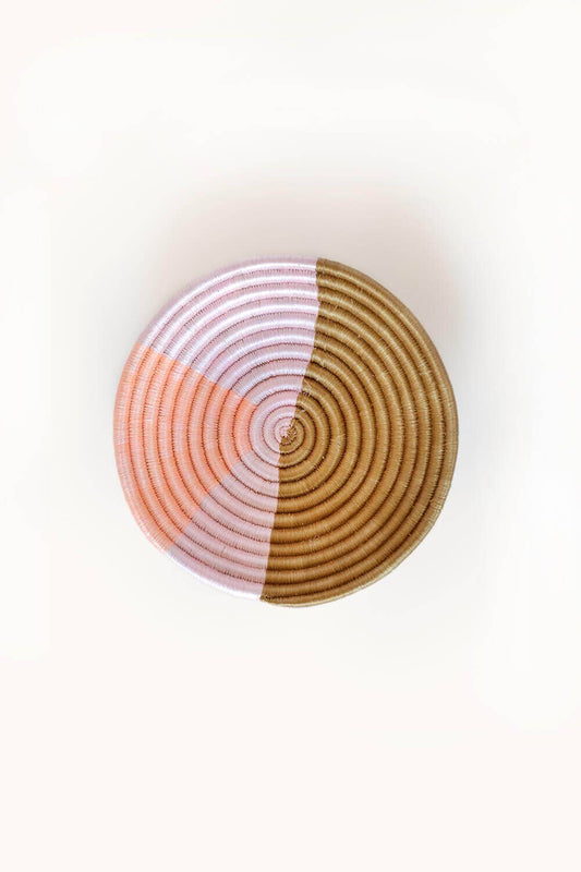 Round coaster with concentric circle pattern on a white background