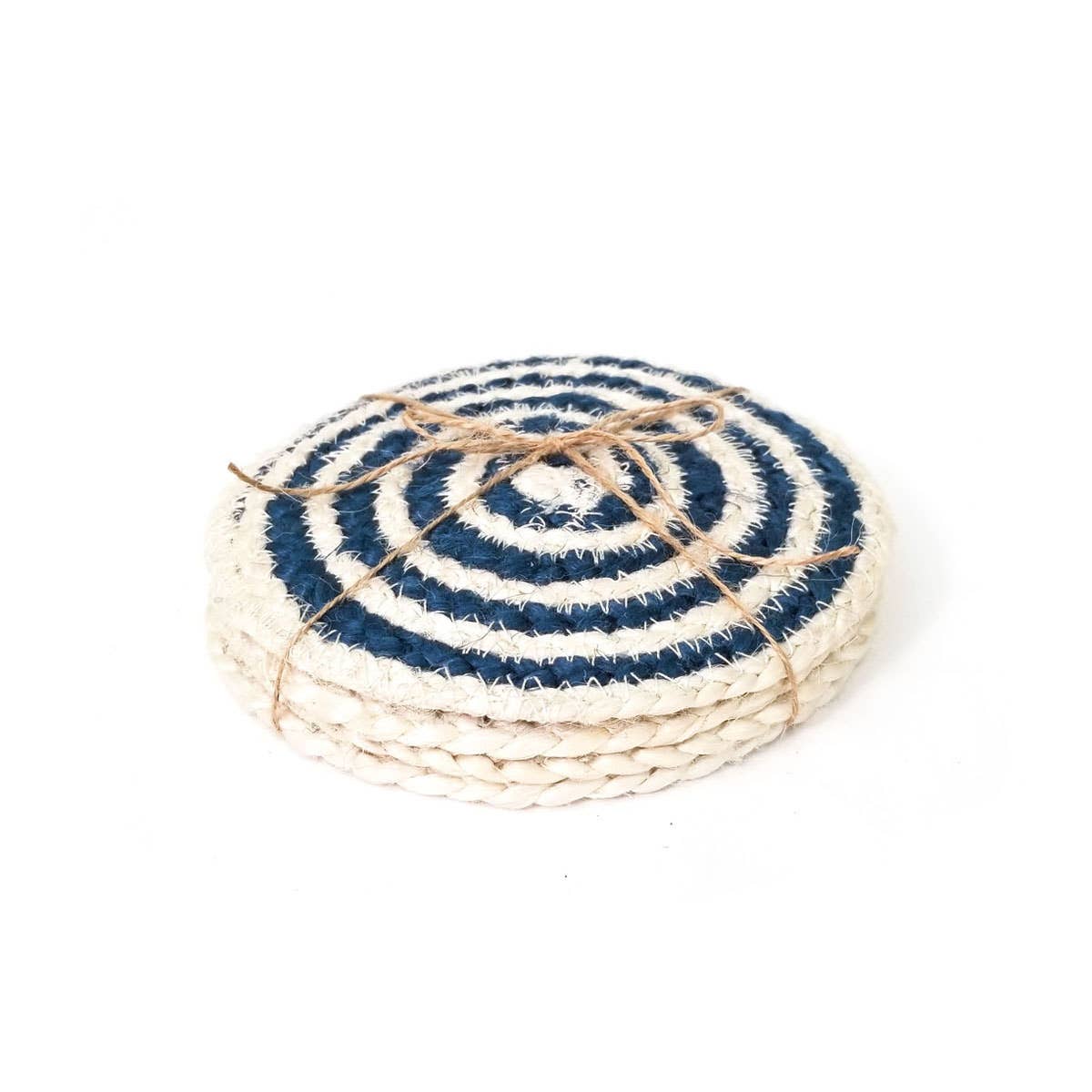 Round woven coaster with blue and white pattern on a white background