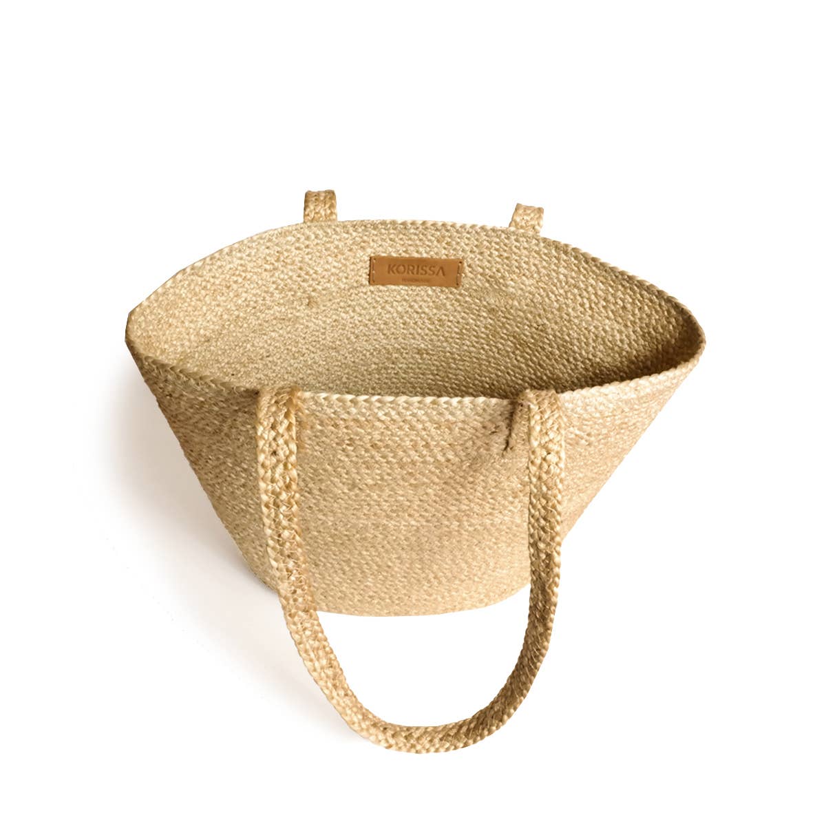 Woven straw bag with a visible brand label on a white background